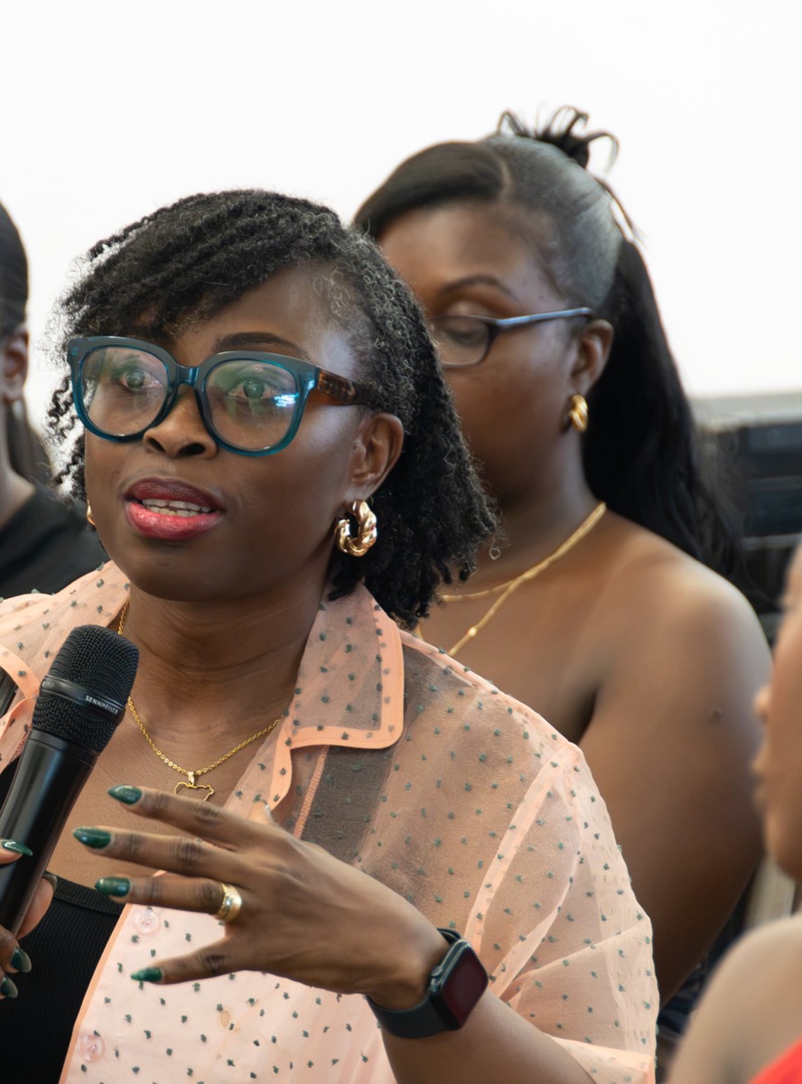 A guest asking a question from the audience